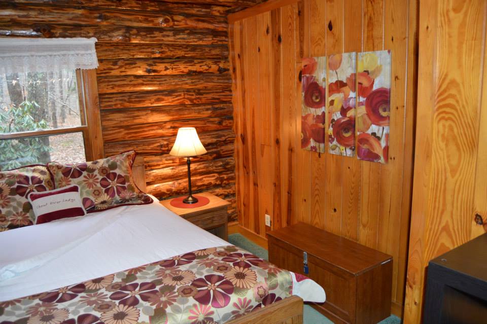 Bedroom with Floral Painting
